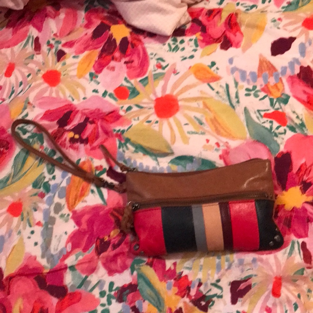 The sak  clutch with phone battery charger!